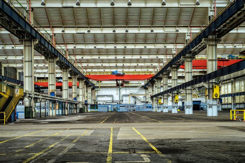 A picture of a large warehouse as seen from the inside