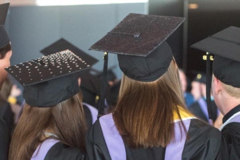 students in graduation caps and gowns