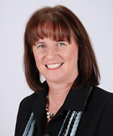 A headshot of a woman