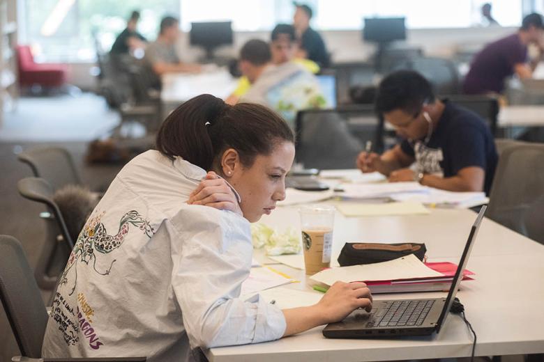 Student at her laptop in Beatty Hall