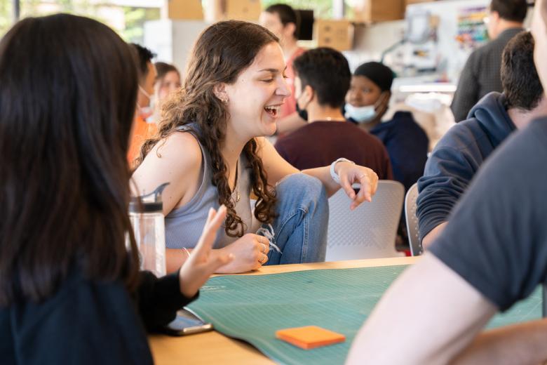 Students smile at the Accelerate space open house