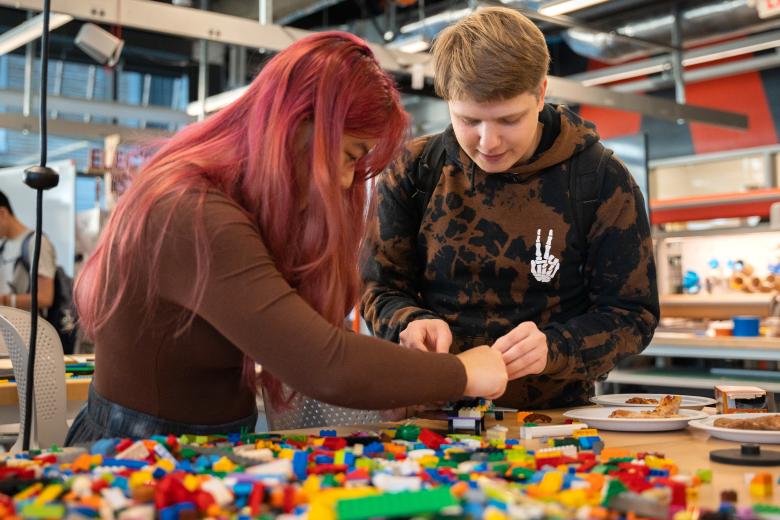 students working with legos