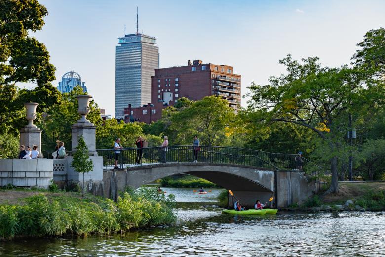 The Prudential Center as seen from the Charles River during the evening