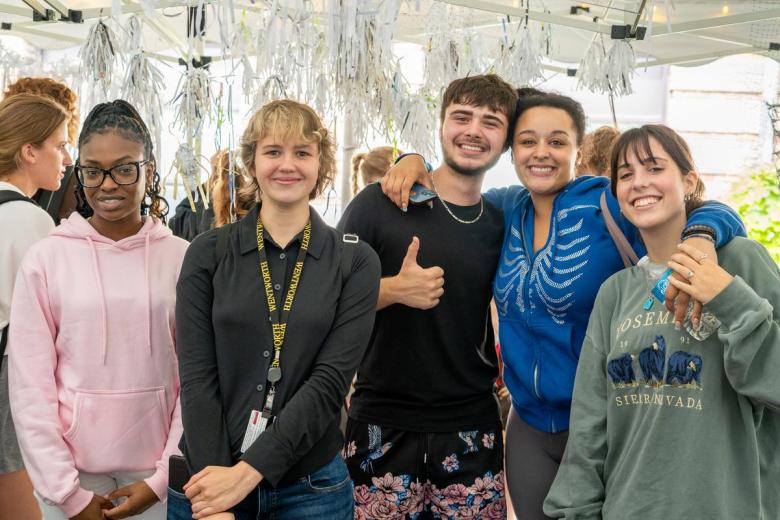 School of Architecture & Design students experiencing paper art in the tent on the quad.